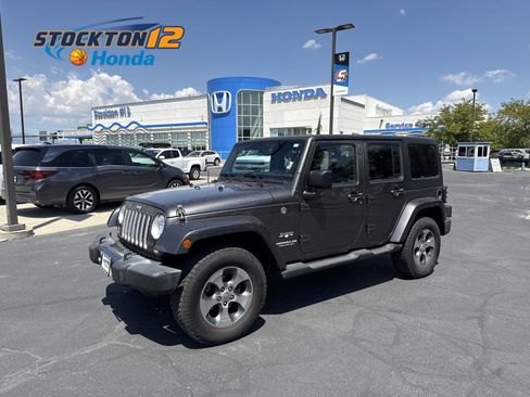 Used 2016 Jeep Wrangler Unlimited Sahara w/ Connectivity Group AWD/4WD image 1