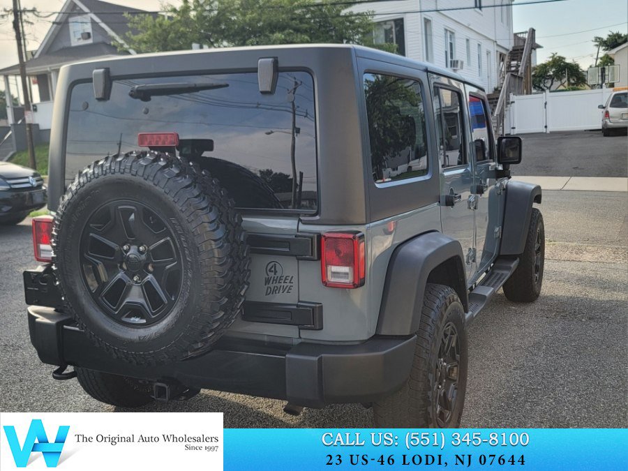 Used 2015 Jeep Wrangler Unlimited Sport w/ Dual Top Group AWD/4WD image 6