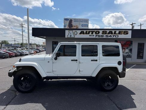 Used 2015 Jeep Wrangler Unlimited Sahara AWD/4WD image 1