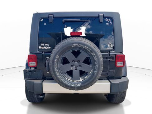 Used 2014 Jeep Wrangler Unlimited Sahara w/ Dual Top Group AWD/4WD image 8
