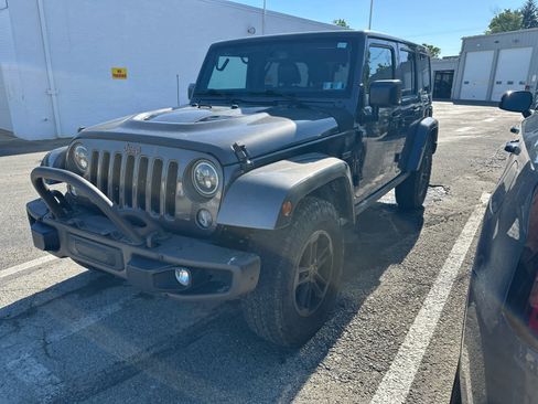 Used 2016 Jeep Wrangler Unlimited Sahara AWD/4WD image 1