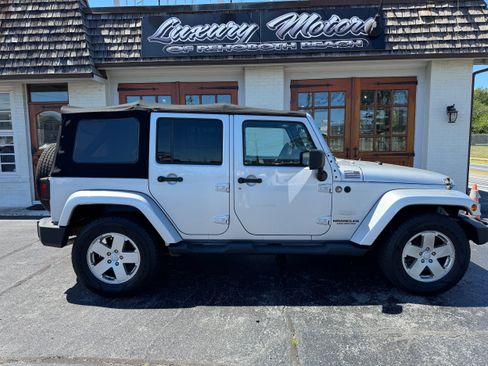 Used 2010 Jeep Wrangler Unlimited Sahara w/ Trailer Tow Group AWD/4WD image 1