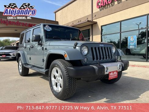 Used 2014 Jeep Wrangler Unlimited Sahara w/ Connectivity Group AWD/4WD image 1