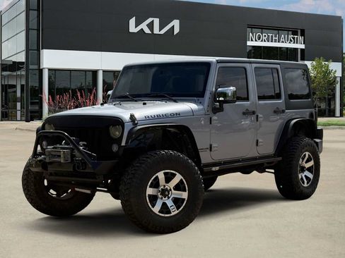 Used 2015 Jeep Wrangler Unlimited Rubicon w/ Connectivity Group AWD/4WD image 1