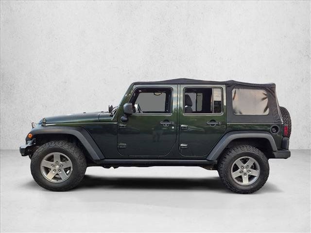 Used 2011 Jeep Wrangler Unlimited Rubicon w/ Connectivity Group AWD/4WD image 8