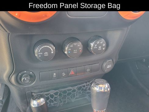 Used 2012 Jeep Wrangler Unlimited Sahara w/ Dual Top Group AWD/4WD image 24