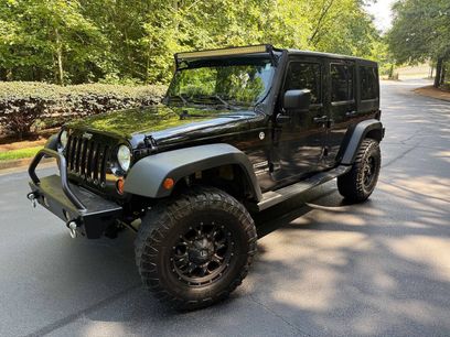 Used 2013 Jeep Wrangler Unlimited Sport
