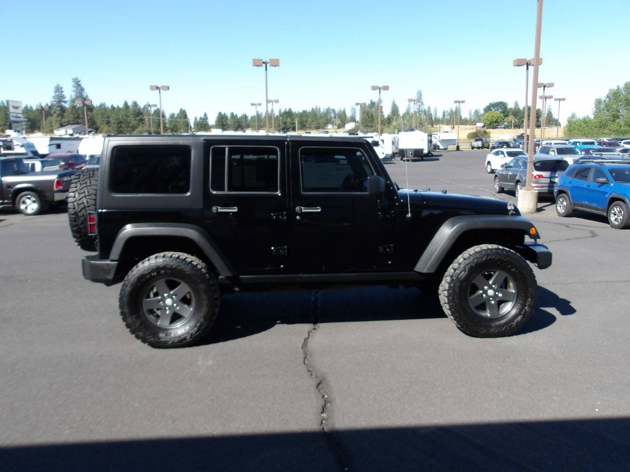 Used 2011 Jeep Wrangler Unlimited Rubicon w/ Dual Top Group AWD/4WD image 6