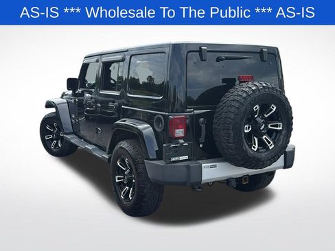Used 2012 Jeep Wrangler Unlimited Sahara w/ Dual Top Group AWD/4WD image 5