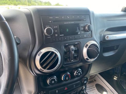 Used 2013 Jeep Wrangler Unlimited Rubicon w/ Dual Top Group AWD/4WD image 12