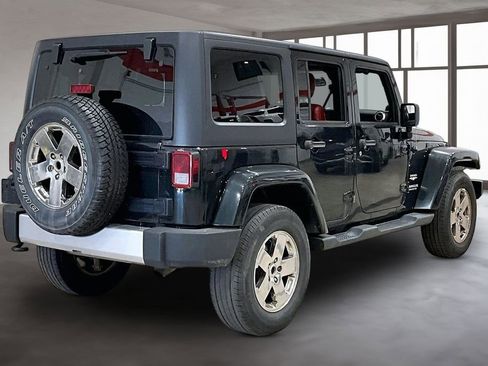 Used 2012 Jeep Wrangler Unlimited Sahara w/ Dual Top Group AWD/4WD image 2