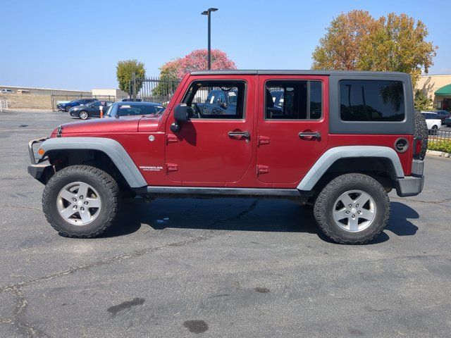 Used 2012 Jeep Wrangler Unlimited Rubicon w/ Connectivity Group AWD/4WD image 2