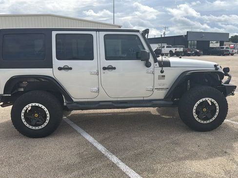 Used 2012 Jeep Wrangler Unlimited Sahara w/ Dual Top Group AWD/4WD image 6
