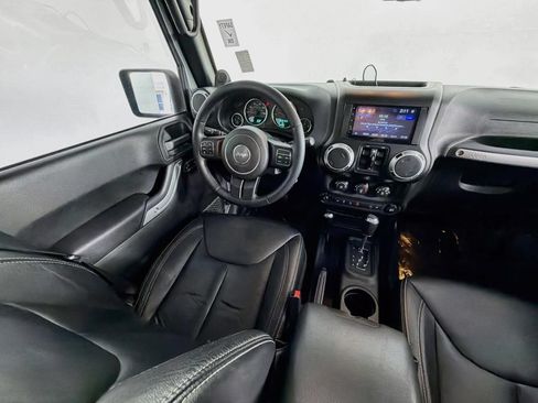 Used 2013 Jeep Wrangler Unlimited Sahara w/ Dual Top Group AWD/4WD image 11