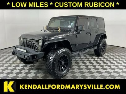 Used 2012 Jeep Wrangler Unlimited Rubicon w/ Dual Top Group