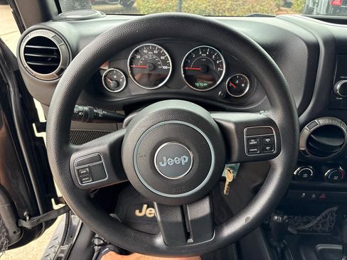 Used 2016 Jeep Wrangler Sport w/ Mopar Black Appearance Group image 17