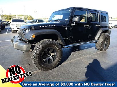 Used 2011 Jeep Wrangler Unlimited Rubicon w/ Dual Top Group