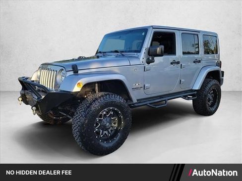 Used 2016 Jeep Wrangler Unlimited Sahara w/ Max Tow Package AWD/4WD image 1