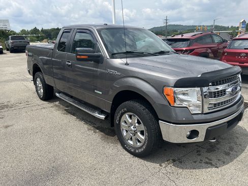 Used 2014 Ford F150 XLT w/ Equipment Group 302A Luxury AWD/4WD image 1