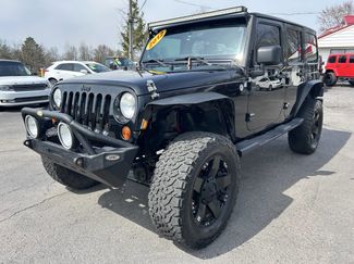 Used 2012 Jeep Wrangler Unlimited Sahara w/ Dual Top Group image 1