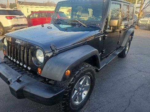 Used 2010 Jeep Wrangler Unlimited Rubicon w/ Dual Top Group image 6