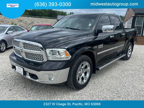 Used 2016 RAM 1500 Laramie w/ Convenience Group AWD/4WD image 1