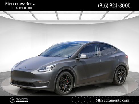 Used 2024 Tesla Model Y Performance AWD/4WD image 1