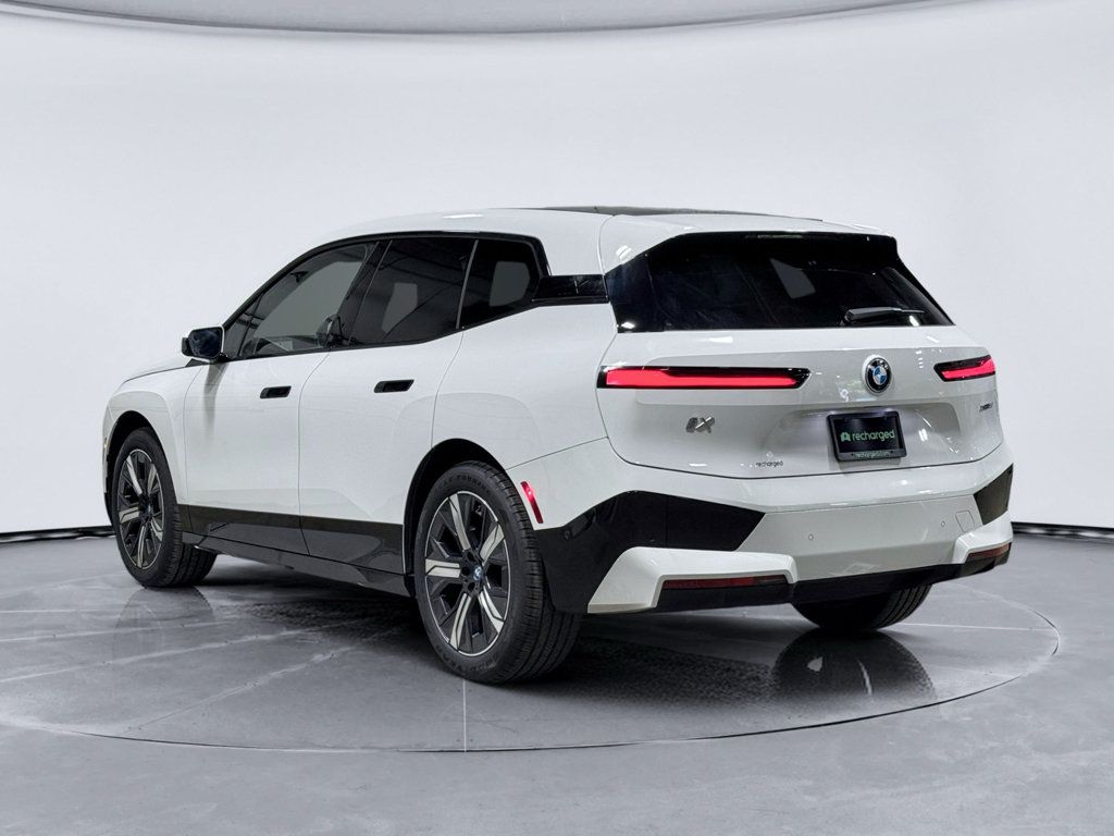 Used 2025 BMW iX xDrive50 w/ Sport Package AWD/4WD image 2