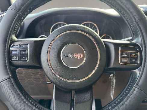 Used 2012 Jeep Wrangler Unlimited Sahara w/ Dual Top Group AWD/4WD image 16