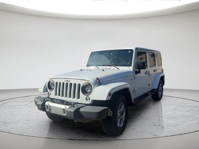 Used 2014 Jeep Wrangler Unlimited Sahara w/ Dual Top Group
