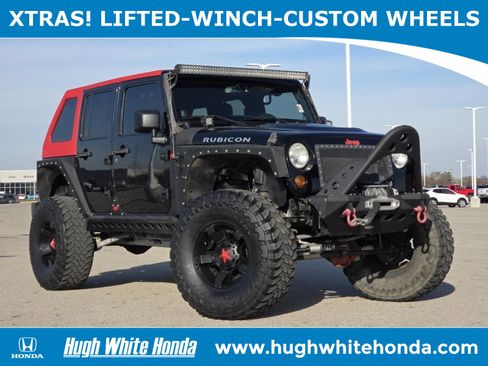 Used 2013 Jeep Wrangler Unlimited Rubicon w/ Max Tow Pkg image 1