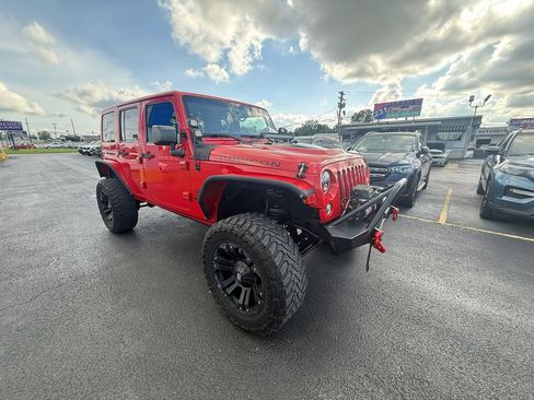 Used 2015 Jeep Wrangler Unlimited Rubicon w/ Dual Top Group AWD/4WD image 1
