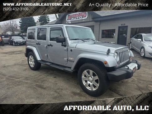 Used 2013 Jeep Wrangler Unlimited Sahara w/ Connectivity Group AWD/4WD image 1