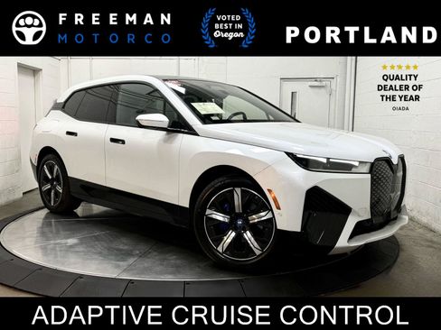 Used 2024 BMW iX xDrive50 w/ Premium Package AWD/4WD image 1