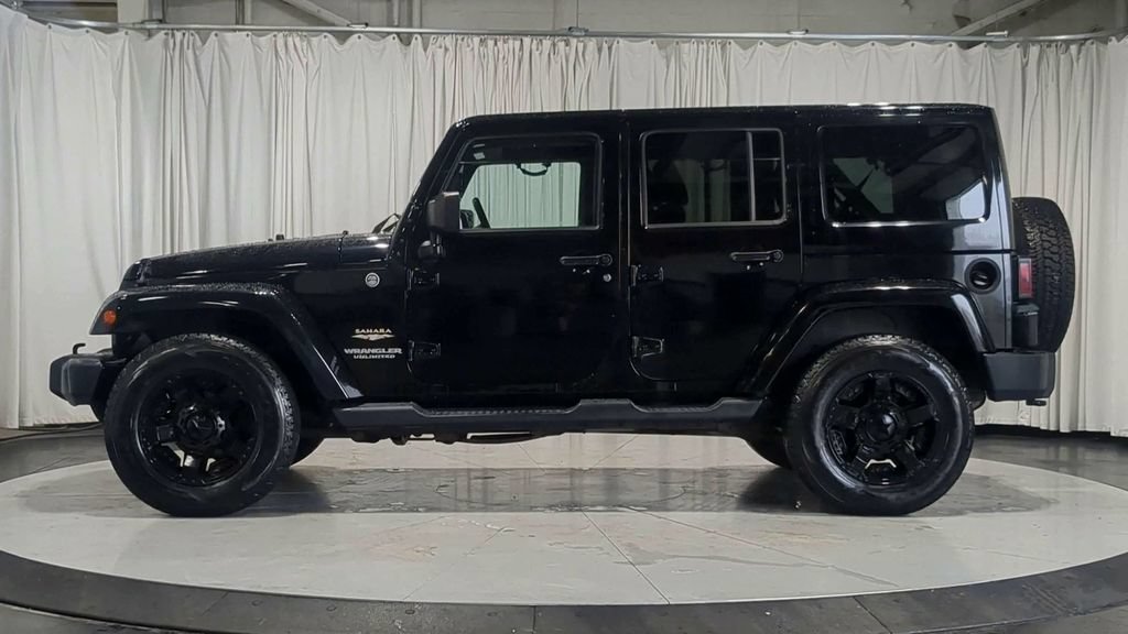 Used 2012 Jeep Wrangler Unlimited Sahara AWD/4WD image 6