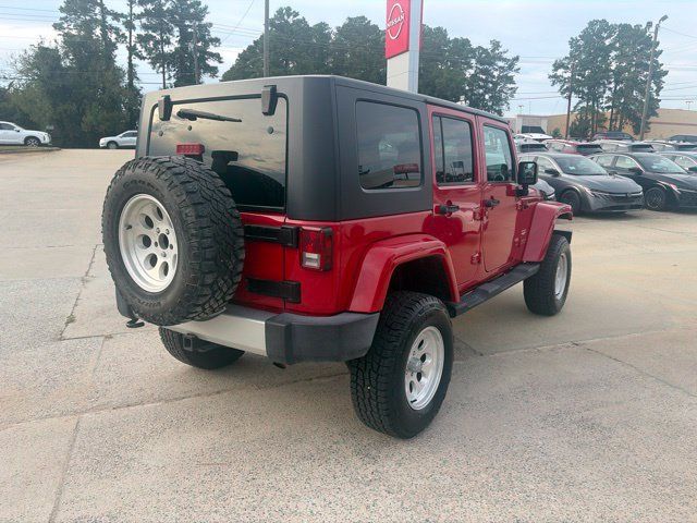 Used 2010 Jeep Wrangler Unlimited Sahara w/ Dual Top Group AWD/4WD image 6