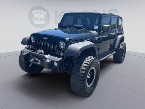 Used 2012 Jeep Wrangler Unlimited Sport AWD/4WD image 1