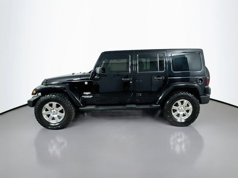 Used 2013 Jeep Wrangler Unlimited Sahara w/ Dual Top Group AWD/4WD image 4