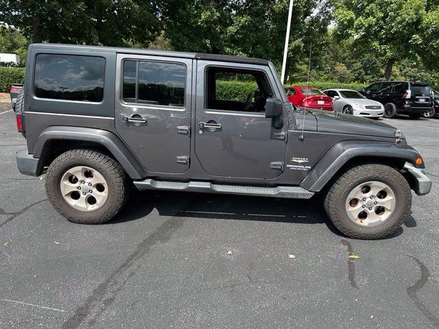 Used 2014 Jeep Wrangler Unlimited Sahara w/ Connectivity Group AWD/4WD image 4