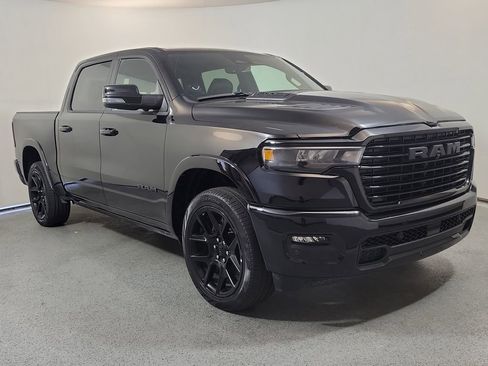 Used 2025 RAM 1500 Laramie w/ Night Edition AWD/4WD image 1