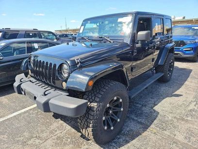 Used 2014 Jeep Wrangler Unlimited Sahara w/ Dual Top Group
