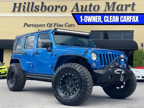 Used 2015 Jeep Wrangler Unlimited Rubicon w/ Connectivity Group AWD/4WD image 1