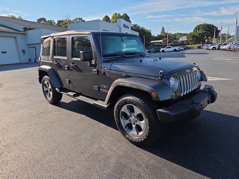 Certified 2017 Jeep Wrangler Unlimited Sahara w/ Connectivity Group AWD/4WD image 1
