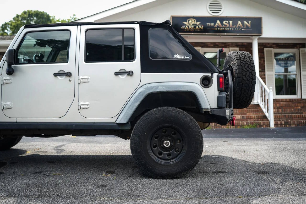 Used 2012 Jeep Wrangler Unlimited Rubicon w/ Dual Top Group AWD/4WD image 16