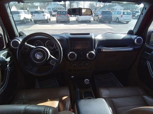 Used 2012 Jeep Wrangler Unlimited Rubicon w/ Dual Top Group image 11