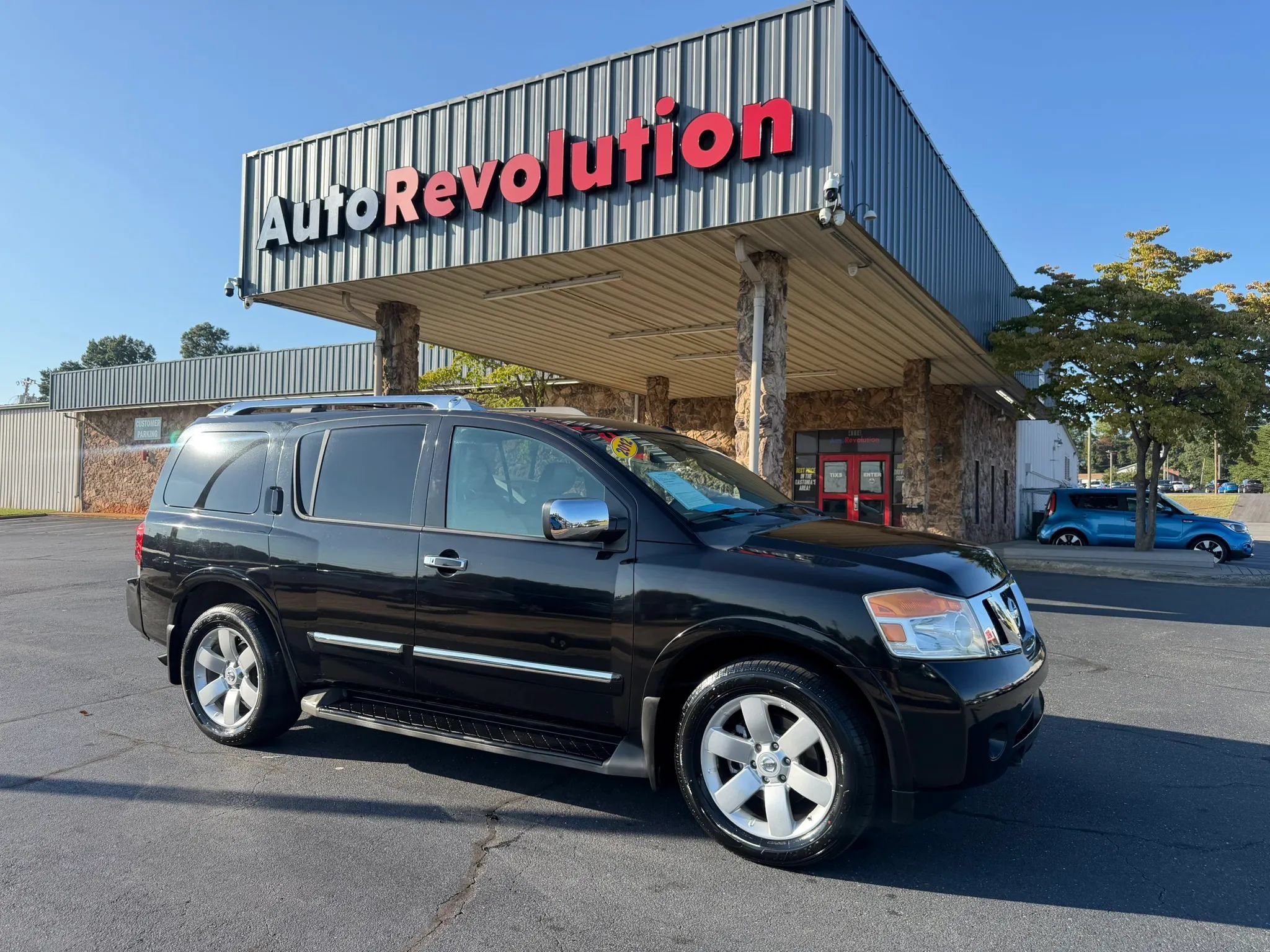 Used 2012 Nissan Armada SL w/ DVD FES Pkg RWD image 1