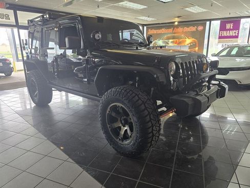 Used 2013 Jeep Wrangler Unlimited Sahara w/ Connectivity Group AWD/4WD image 3