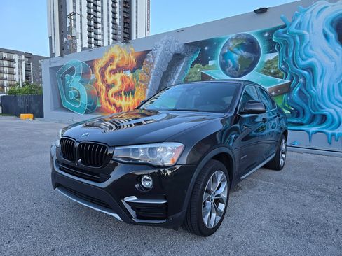 Used 2018 BMW X4 xDrive28i AWD/4WD image 1