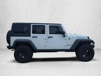 Used 2015 Jeep Wrangler Unlimited Rubicon w/ Connectivity Group AWD/4WD video 4