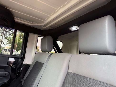 Used 2010 Jeep Wrangler Unlimited Sahara w/ Dual Top Group AWD/4WD image 11